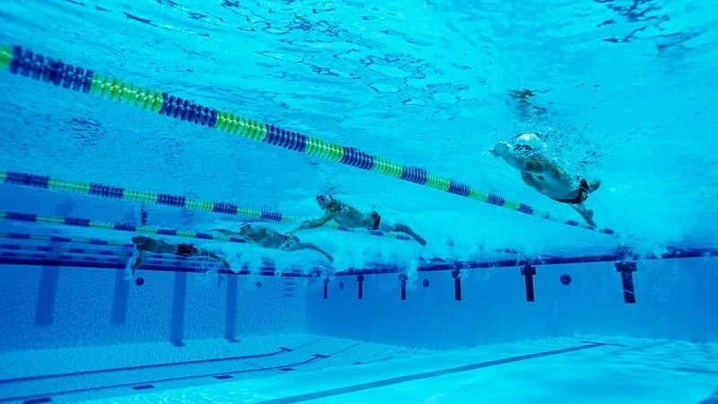 why do swimmers have bad posture?