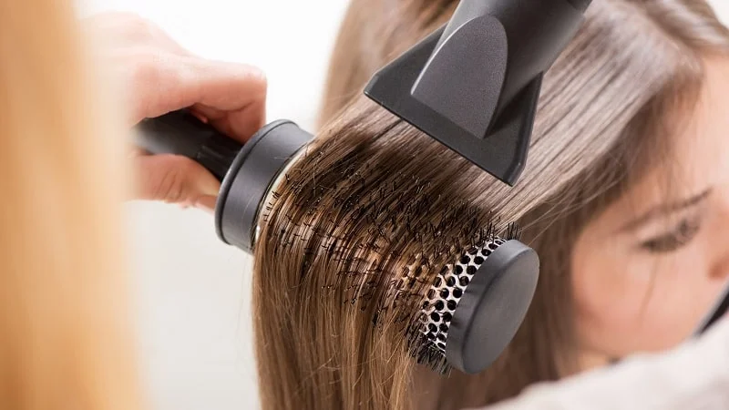 can blow drying hair cause dandruff