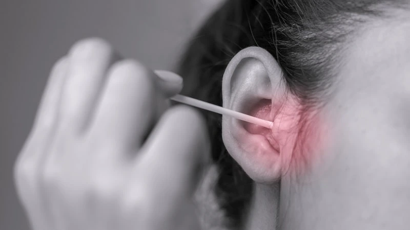 how to massage ear wax out 